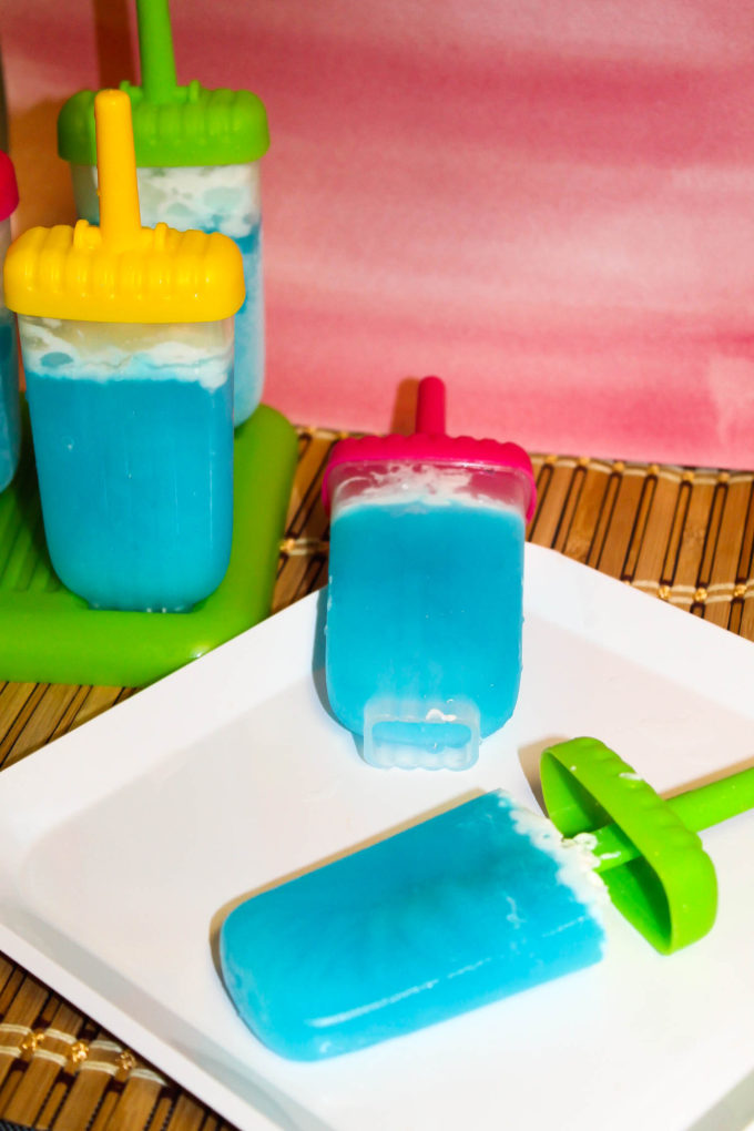 Grab a box of your favorite gelatin and mix up these super easy Berry Blue Wave ice pops! Perfect for these dog days of summer!
