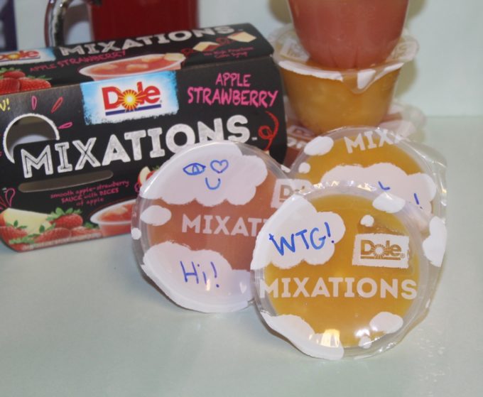 Boost your tween's confidence without embarrassing him with subtle lunch box notes on DOLE Mixations lids!