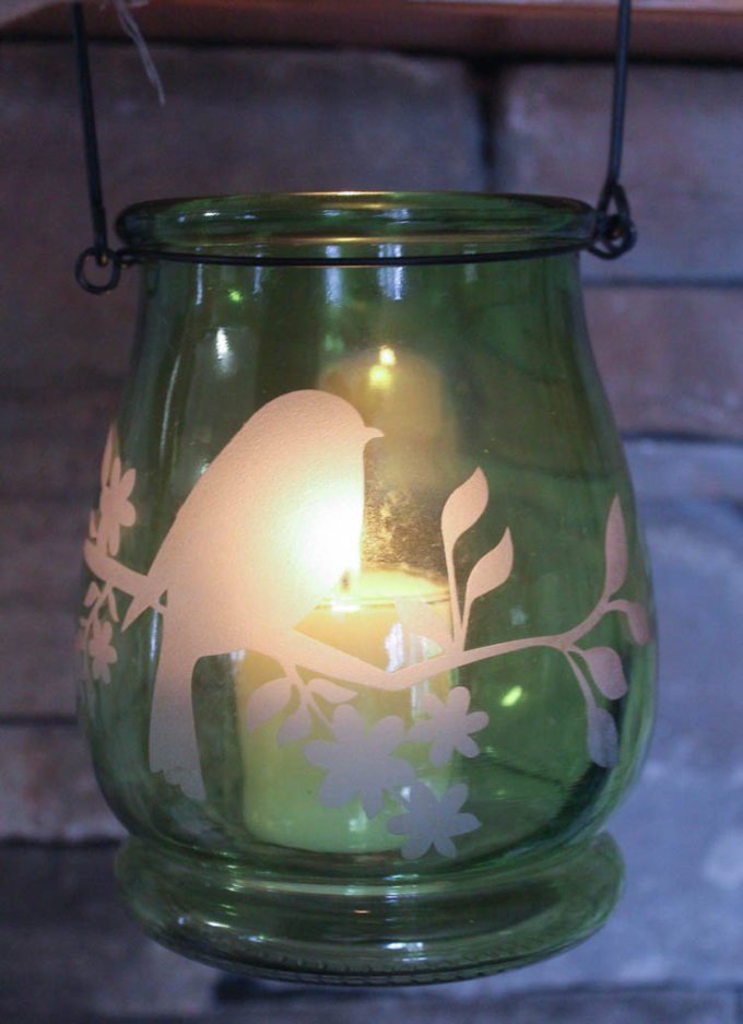 Reuse a vase to create a beautiful luminary to brighten up summer nights or as an emergency lantern for when the power goes out. 